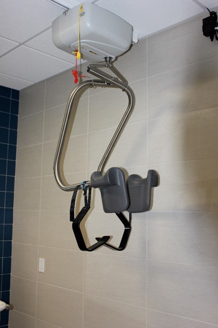 Surehands Lift & Care Systems is a mechanical solution for maneuvering around a dorm room and sitting down without the use of legs. Accessible in the bathroom and bedroom